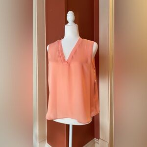 NWT-new with tags! Worthington peach-pink sleeveless blouse. Size Petite Medium.